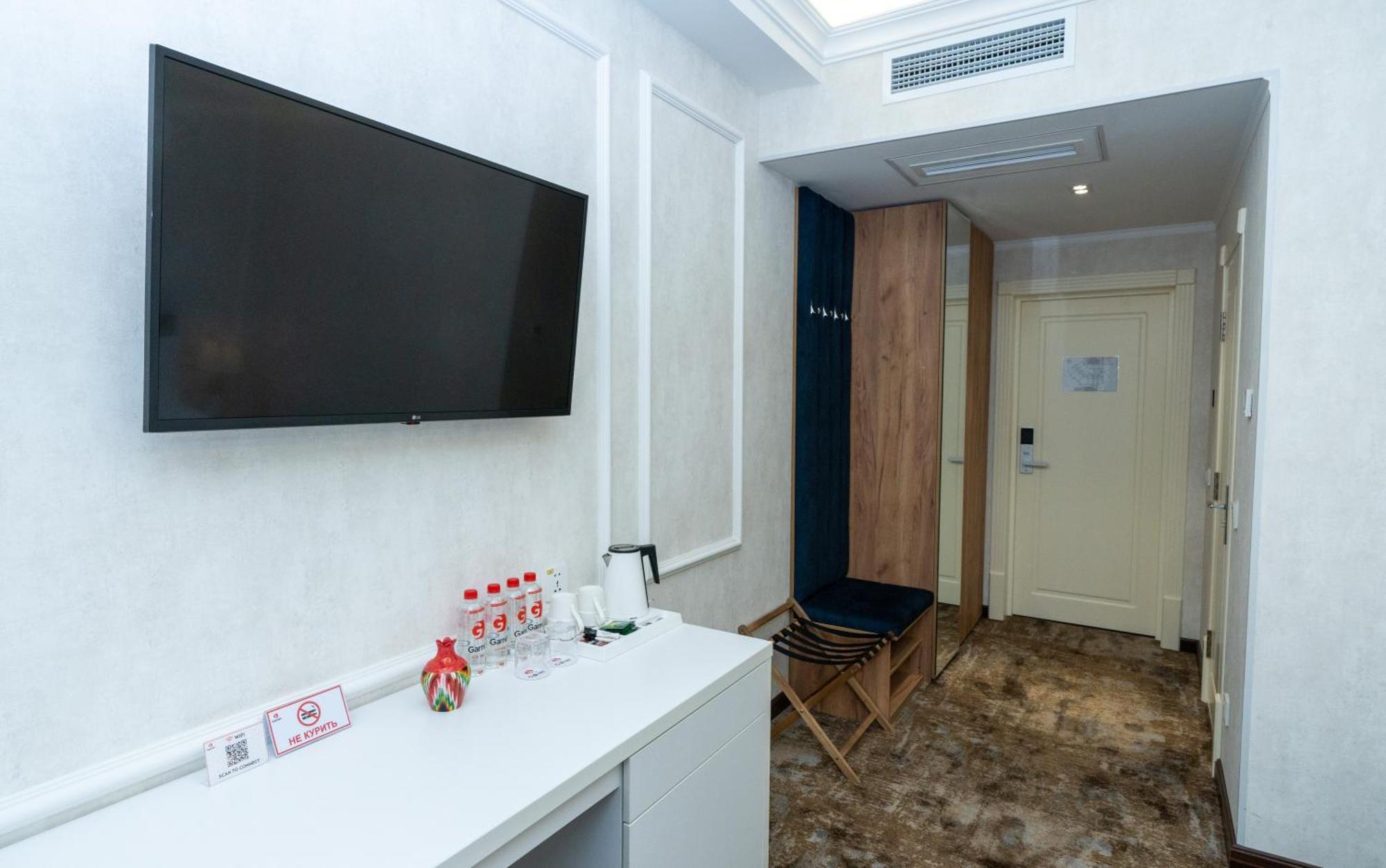 Garnet Mir Hotel Tasjkent Rum bild